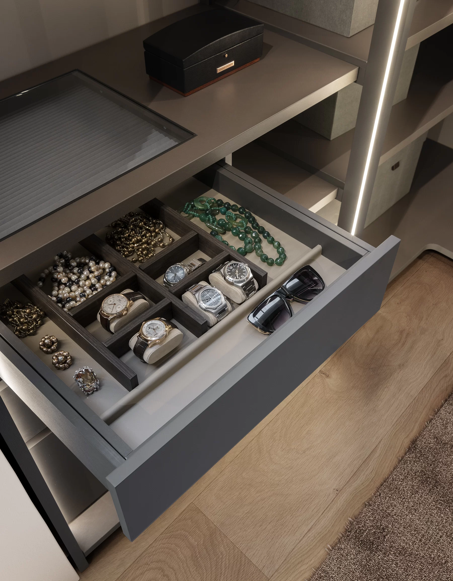 Kabinarmadio wardrobe interior detail — rotating carousel, jewellery drawer and custom fittings