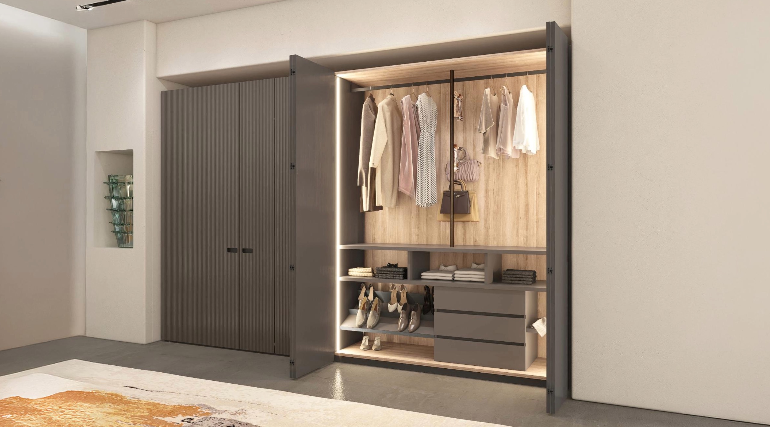 Luxury walk-in wardrobe interior with island bench and integrated lighting